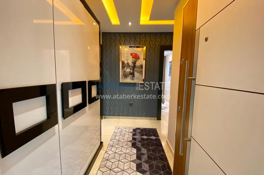 Приобрести Квартира с открытым видом на море в Махмутларе – дизайнерский интерьер, новая мебель 1