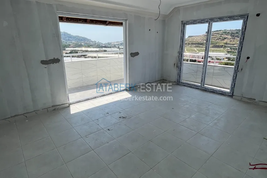 Приобрести Двухуровневый пентхаус в Алании - Конаклы с видом на море в новостройке 2 