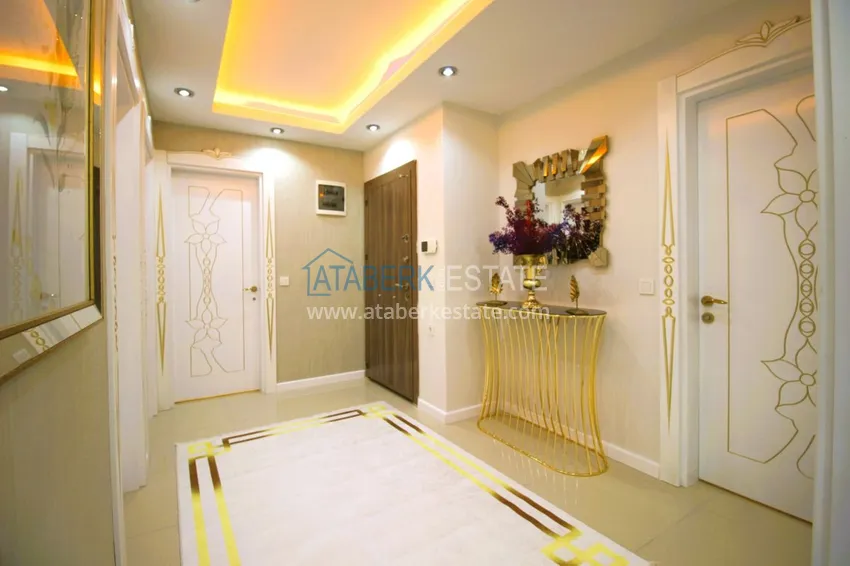 Приобрести Квартира в центре района Махмутлар с авторским ремонтом и новой современной мебелью 1