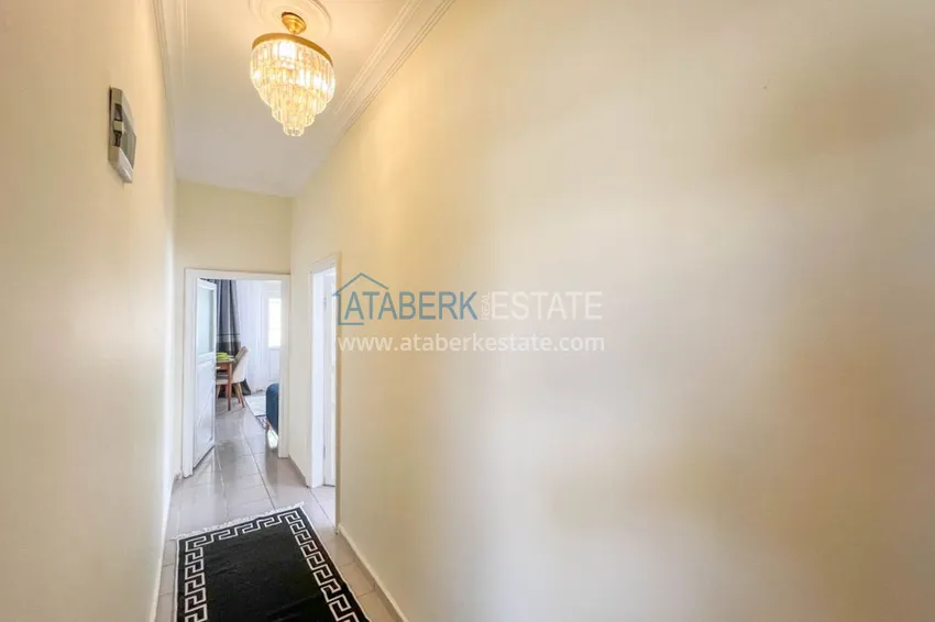 Приобрести Двухкомнатная квартира на берегу моря с новой мебелью - первая линия Махмутлар 1