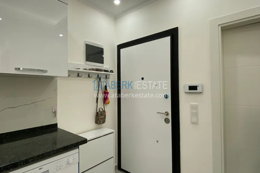 Приобрести Квартира 1+1 с мебелью в современном новом комплексе – район Махмутлар 1 