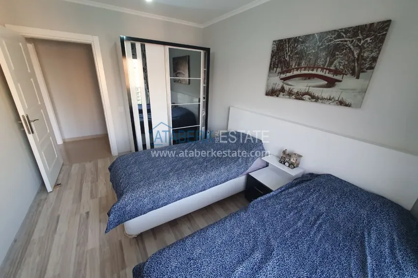 Приобрести Меблированная квартира с отдельной кухней, видом на море и горы - Алания район Махмутлар 10 