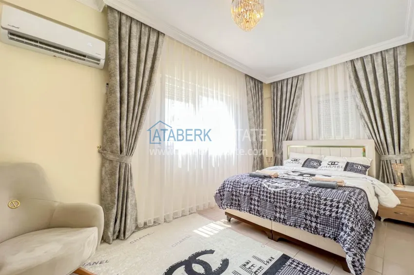 Приобрести Двухкомнатная квартира на берегу моря с новой мебелью - первая линия Махмутлар 11