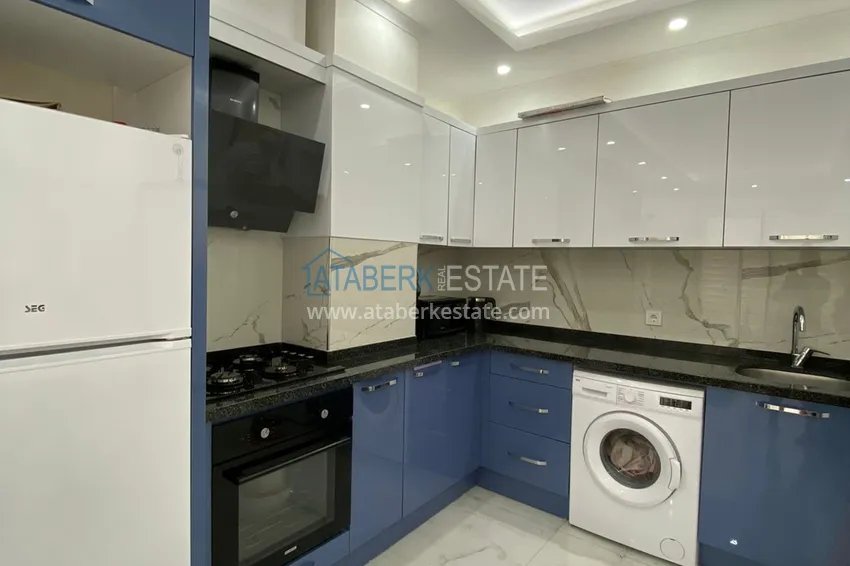 Приобрести Квартира 1+1 с мебелью в современном новом комплексе – район Махмутлар 12 