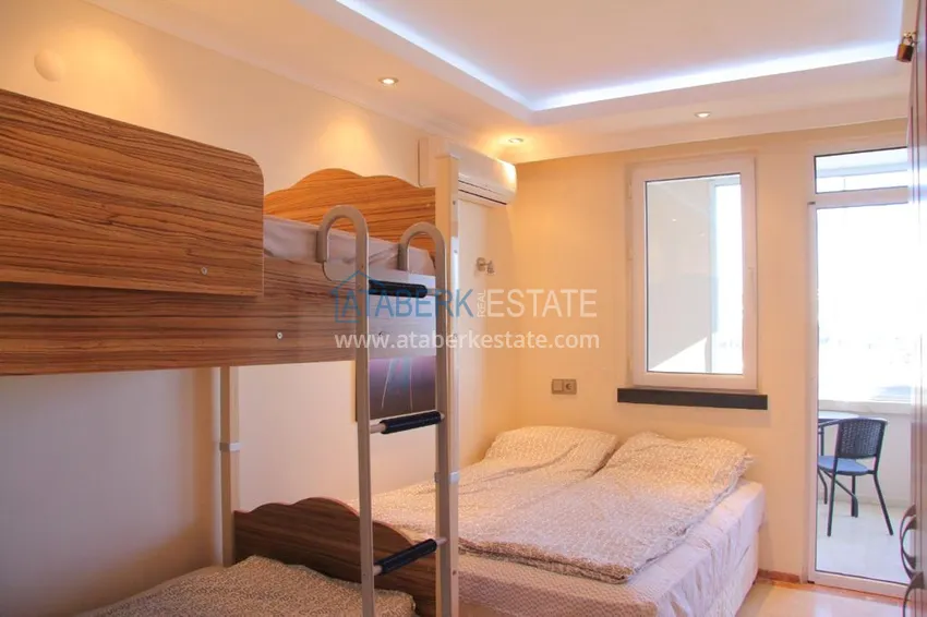 Приобрести Двухэтажная квартира в районе Тосмур с мебелью в комплексе на берегу горной реки  13 