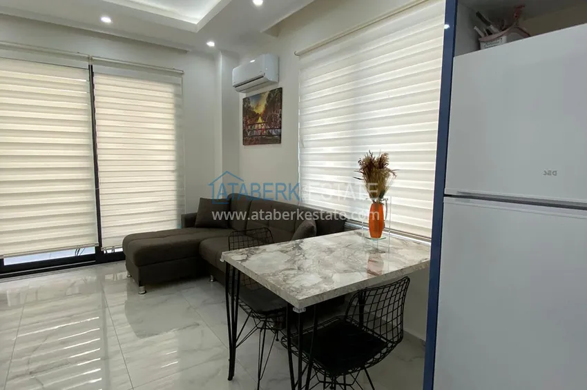 Приобрести Квартира 1+1 с мебелью в современном новом комплексе – район Махмутлар 13 