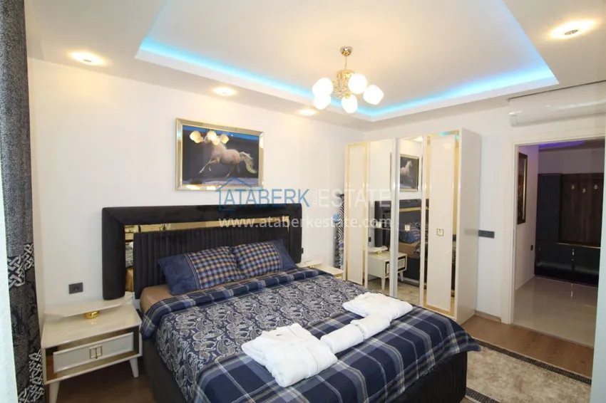 Приобрести Квартира в районе Тосмур двухкомнатная с современной мебелью и застекленным балконом 10 