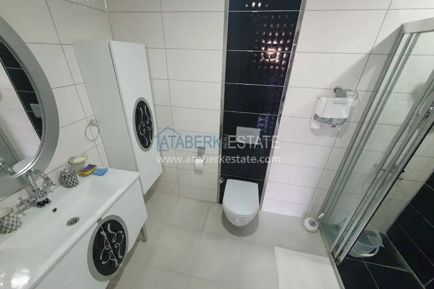 Приобрести Меблированная квартира с отдельной кухней, видом на море и горы - Алания район Махмутлар 13 