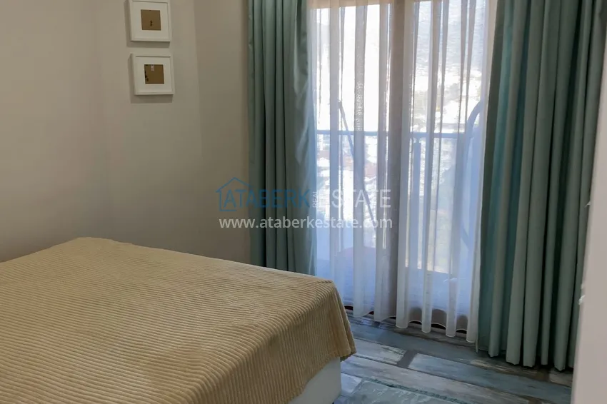 Приобрести Двухкомнатная квартира с мебелью, застекленным балконом и с панорамным открытым видом на море и горы – Газипаша 14 