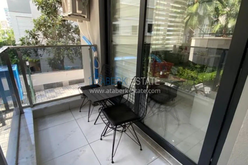 Приобрести Квартира 1+1 с мебелью в современном новом комплексе – район Махмутлар 15 