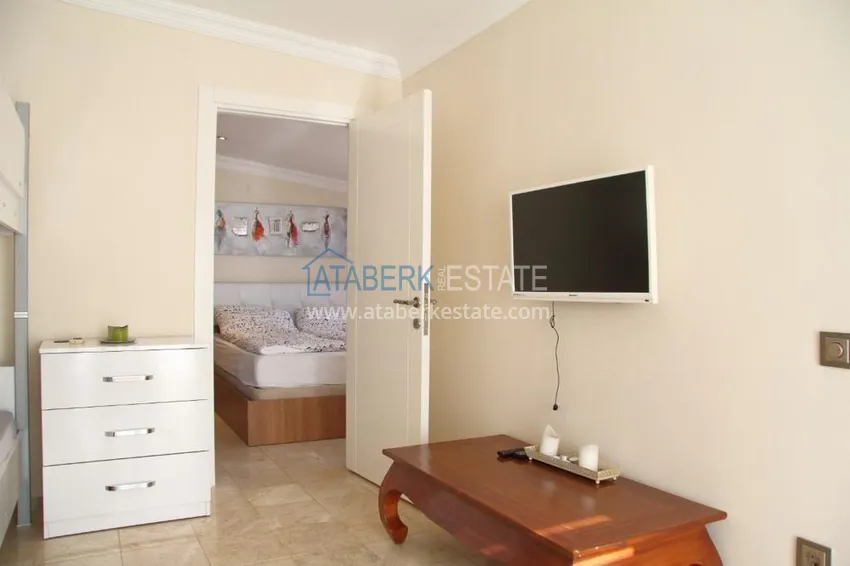 Приобрести Двухэтажная квартира в районе Тосмур с мебелью в комплексе на берегу горной реки  16 