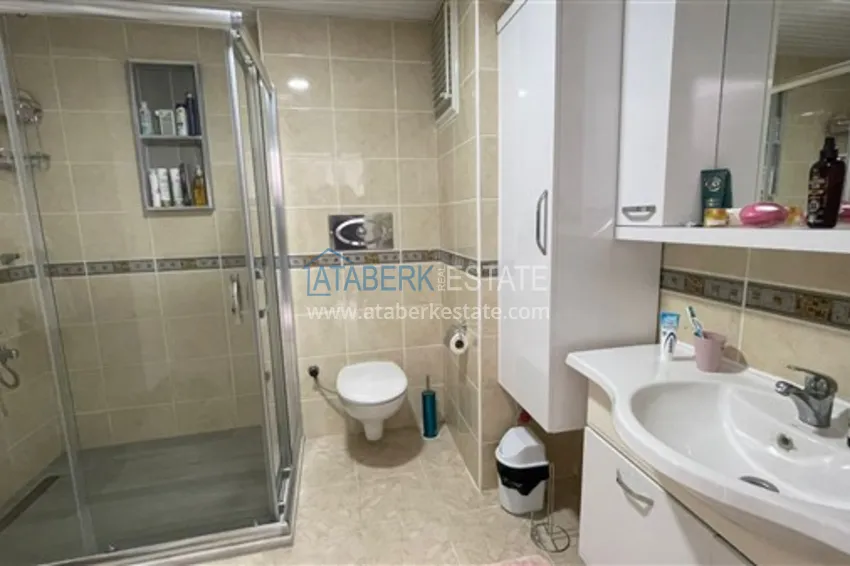 Приобрести Квартира с двумя спальнями и видом на горы и море, район Джиджилли - Алания 15 