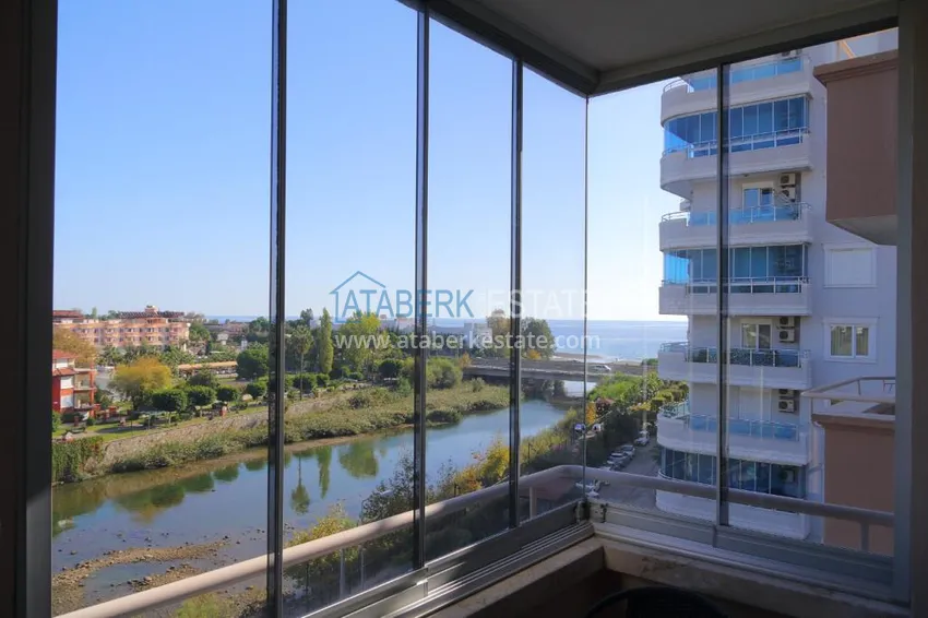 Приобрести Двухэтажная квартира в районе Тосмур с мебелью в комплексе на берегу горной реки  18 