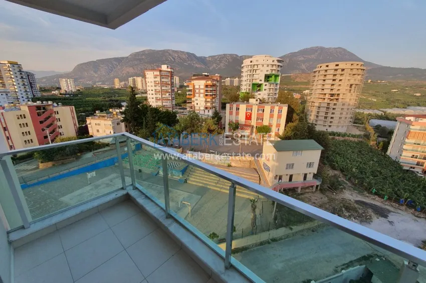 Приобрести Меблированная квартира с отдельной кухней, видом на море и горы - Алания район Махмутлар 17 