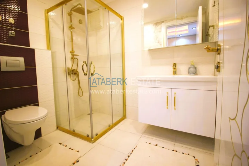 Приобрести Квартира в центре района Махмутлар с авторским ремонтом и новой современной мебелью 25