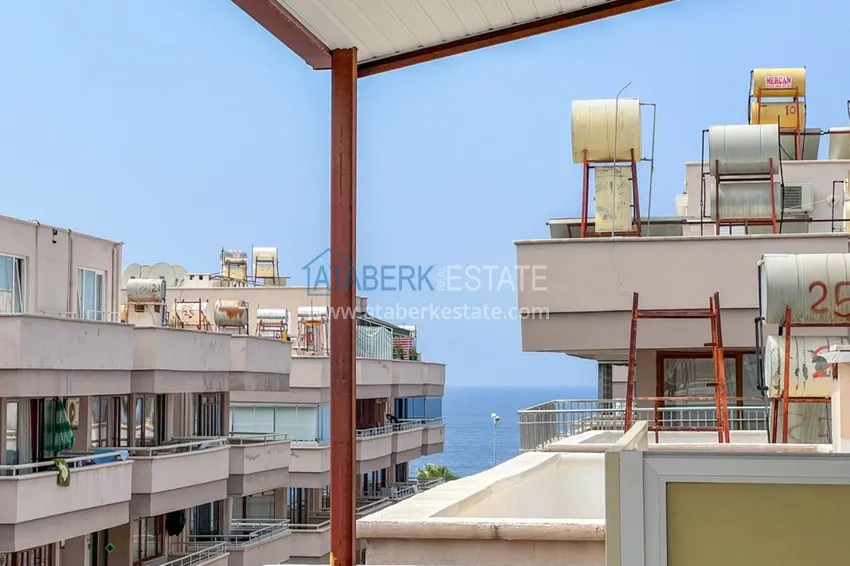 Приобрести Двухкомнатная квартира на берегу моря с новой мебелью - первая линия Махмутлар 19