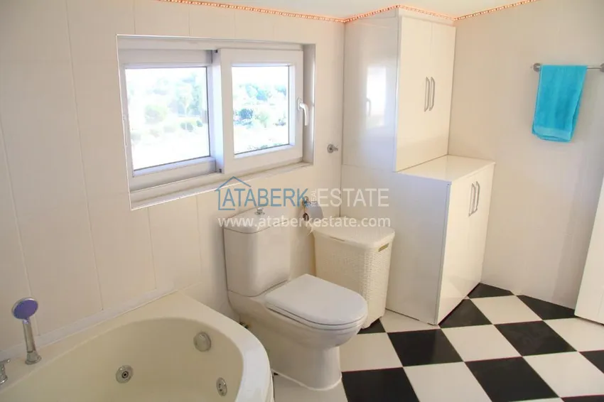 Приобрести Двухэтажная квартира в районе Тосмур с мебелью в комплексе на берегу горной реки  20 