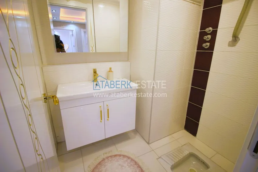 Приобрести Квартира в центре района Махмутлар с авторским ремонтом и новой современной мебелью 26