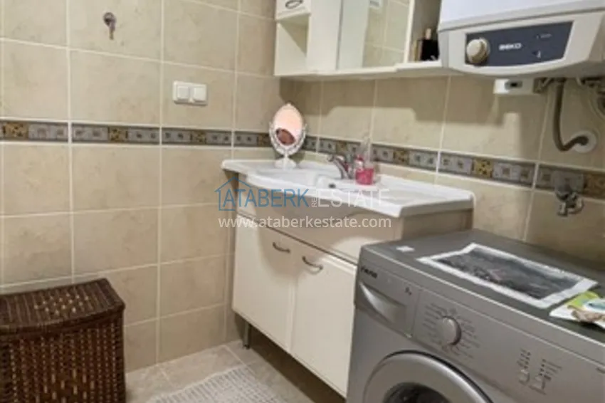 Приобрести Квартира с двумя спальнями и видом на горы и море, район Джиджилли - Алания 19 