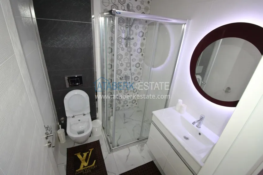 Приобрести Квартира в районе Тосмур двухкомнатная с современной мебелью и застекленным балконом 16 