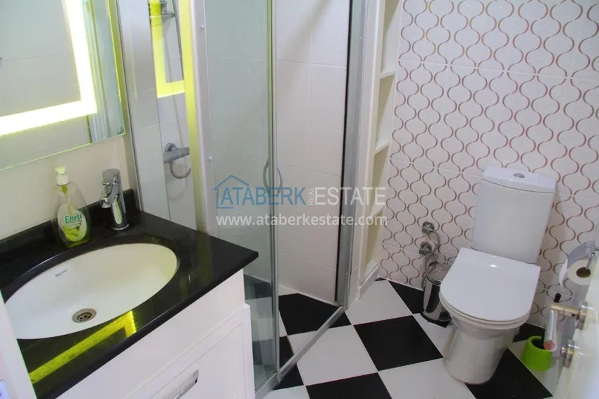 Приобрести Двухэтажная квартира в районе Тосмур с мебелью в комплексе на берегу горной реки  21 