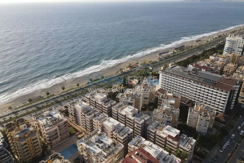 Двухкомнатная квартира на берегу моря с новой мебелью - первая линия Махмутлар 2