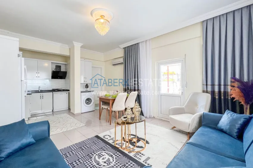 Двухкомнатная квартира на берегу моря с новой мебелью - первая линия Махмутлар 1