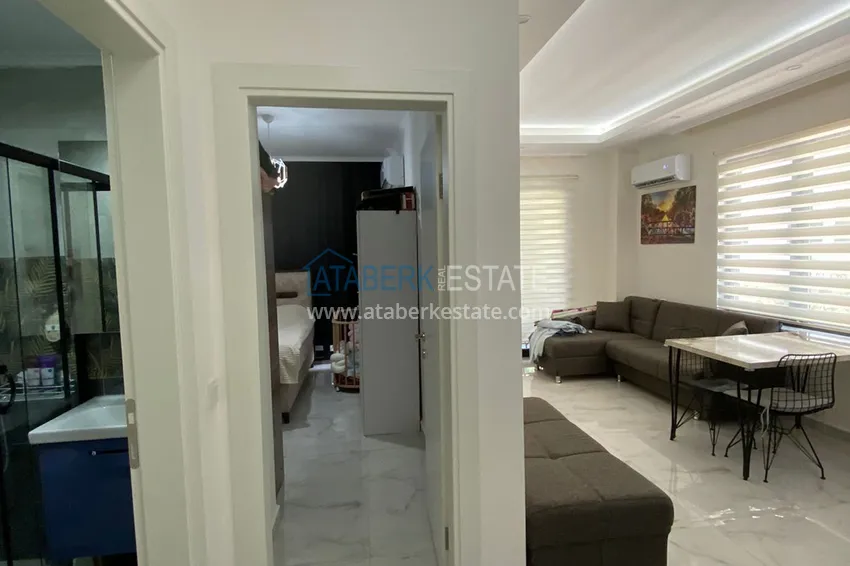 Приобрести Квартира 1+1 с мебелью в современном новом комплексе – район Махмутлар 2 