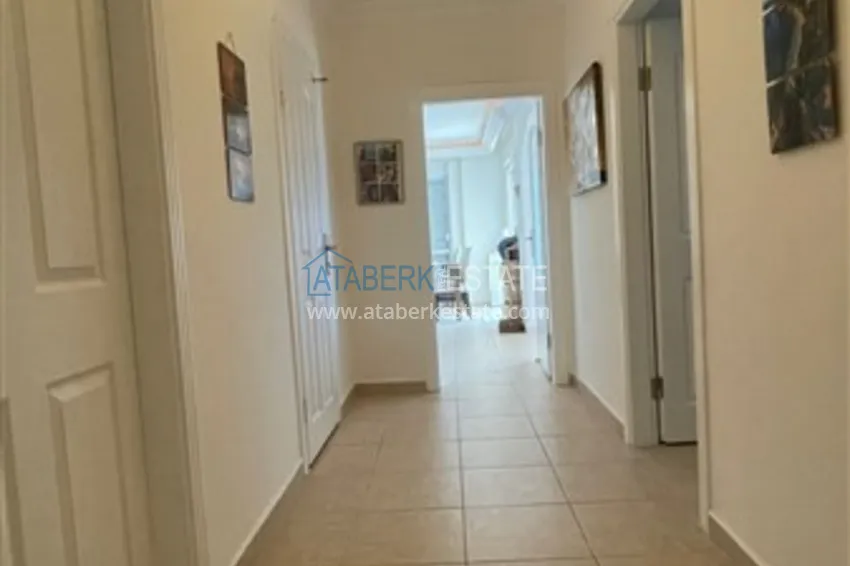 Приобрести Квартира с двумя спальнями и видом на горы и море, район Джиджилли - Алания 1 