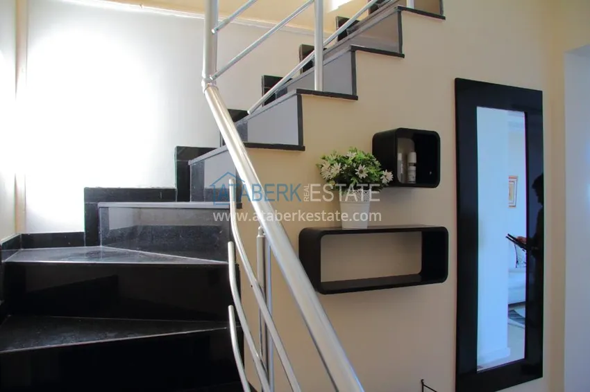 Приобрести Двухэтажная квартира в районе Тосмур с мебелью в комплексе на берегу горной реки  22 