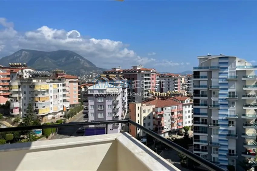 Приобрести Квартира с двумя спальнями и видом на горы и море, район Джиджилли - Алания 24 