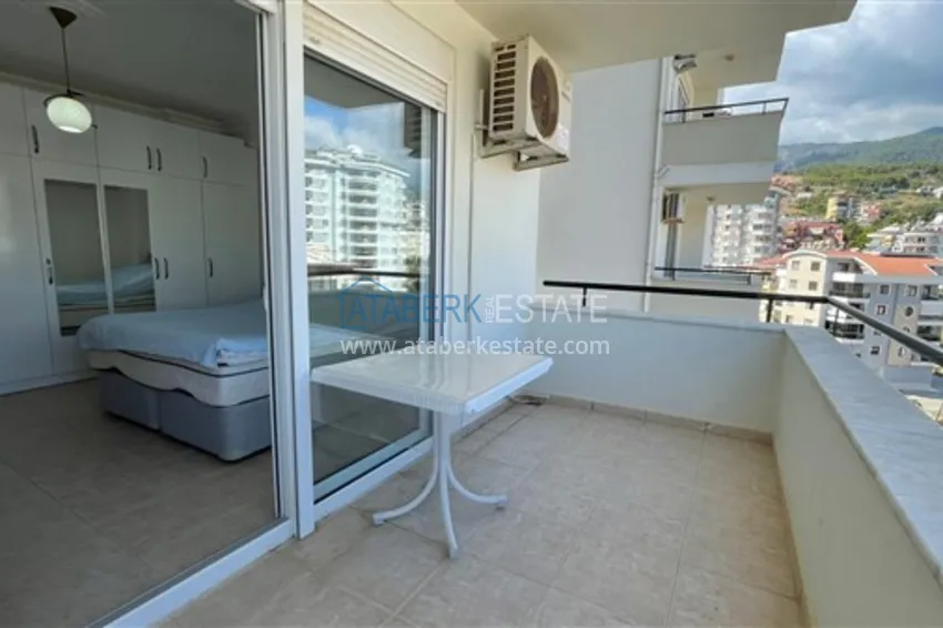 Приобрести Квартира с двумя спальнями и видом на горы и море, район Джиджилли - Алания 25 