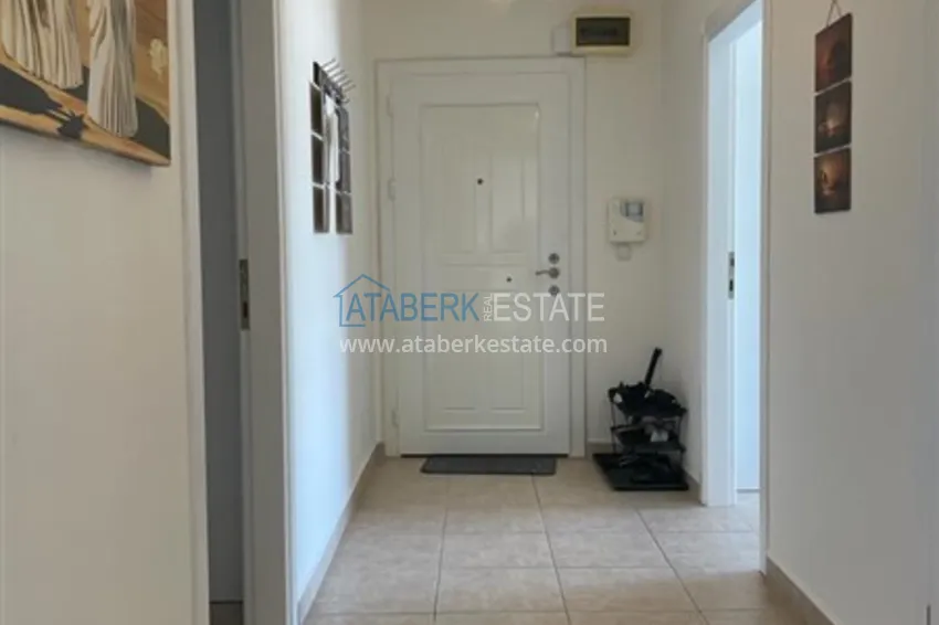 Приобрести Квартира с двумя спальнями и видом на горы и море, район Джиджилли - Алания 2 