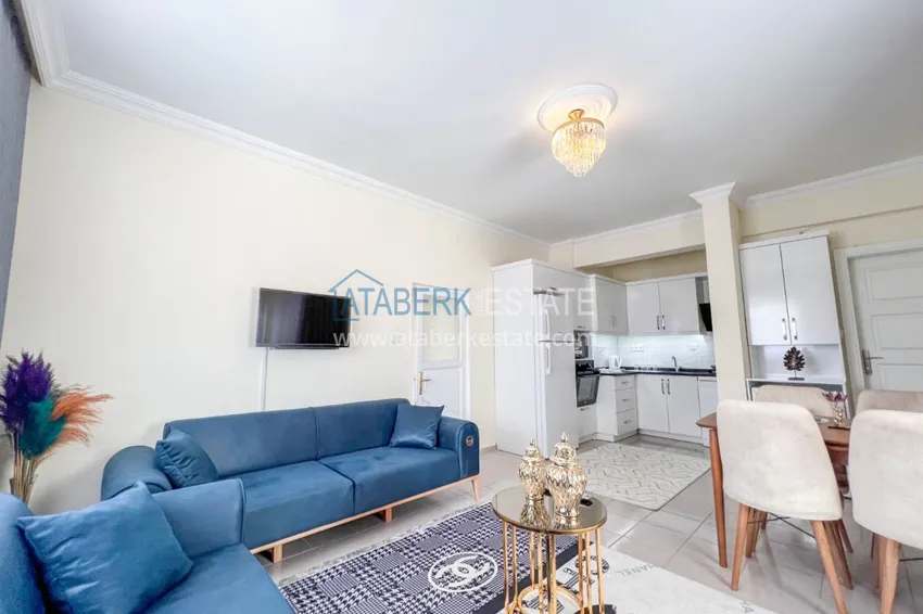 Приобрести Двухкомнатная квартира на берегу моря с новой мебелью - первая линия Махмутлар 4