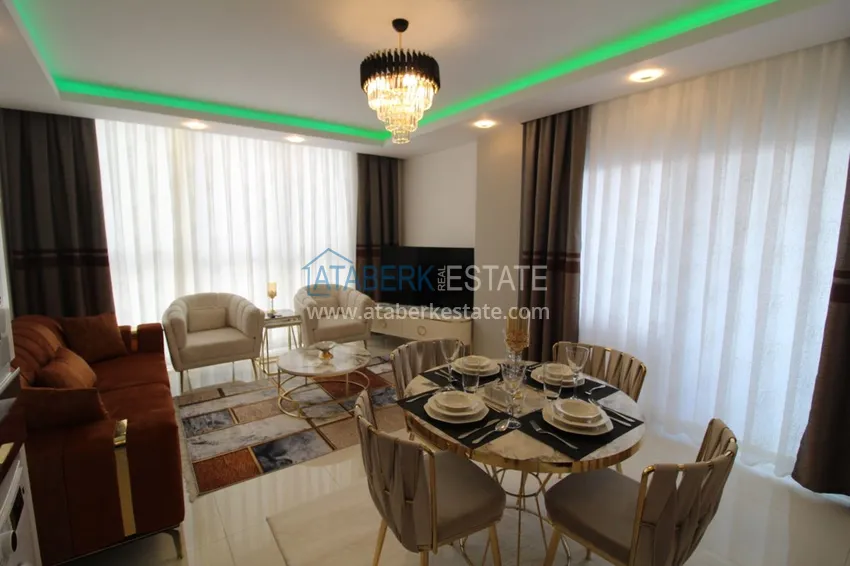 Приобрести Квартира в районе Тосмур двухкомнатная с современной мебелью и застекленным балконом 4 