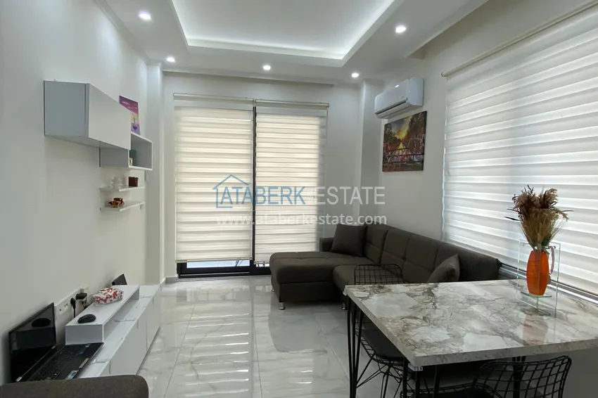 Приобрести Квартира 1+1 с мебелью в современном новом комплексе – район Махмутлар 4 