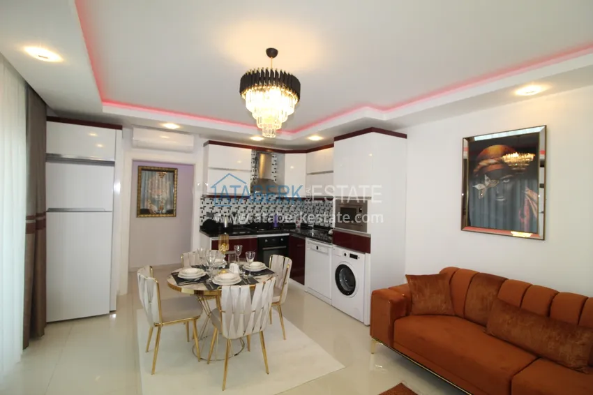 Приобрести Квартира в районе Тосмур двухкомнатная с современной мебелью и застекленным балконом 5 