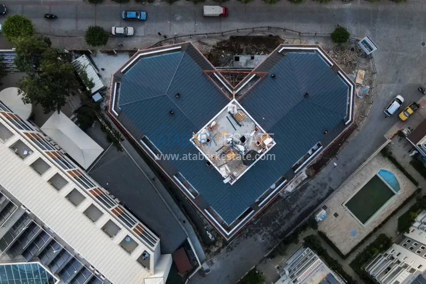 Двухкомнатная квартира в районе Оба в комплексе на этапе строительства 4 