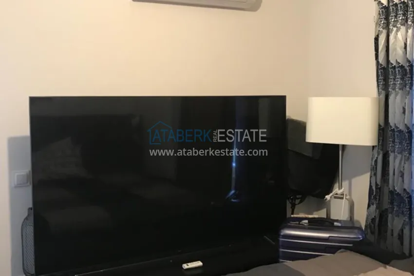 Приобрести Меблированная двухкомнатная квартира в жилом доме без инфраструктуры – Алания, Оба 5 