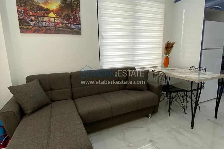 Приобрести Квартира 1+1 с мебелью в современном новом комплексе – район Махмутлар 5 