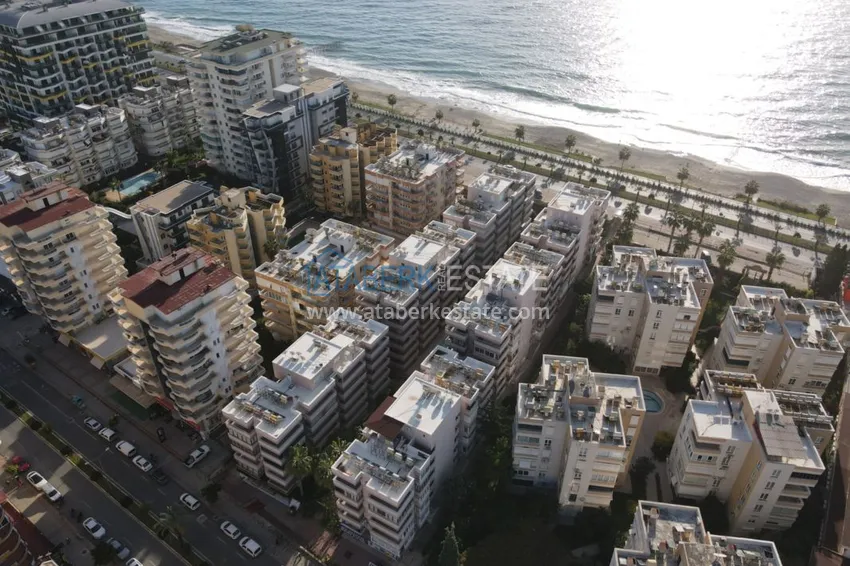 Двухкомнатная квартира на берегу моря с новой мебелью - первая линия Махмутлар 6