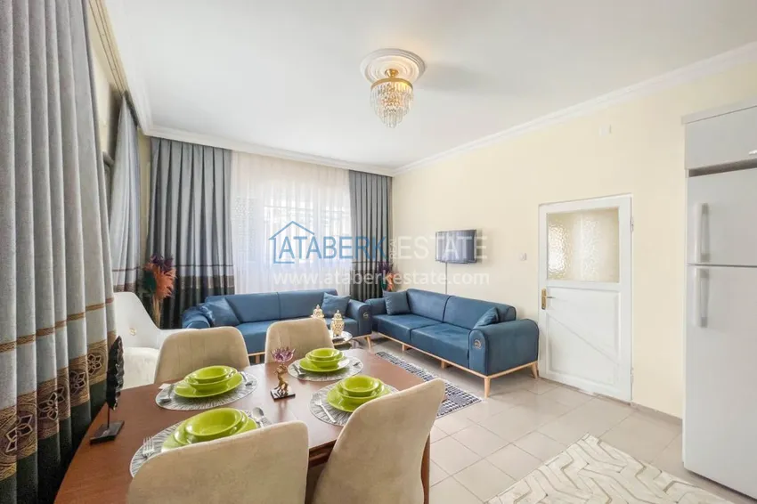 Приобрести Двухкомнатная квартира на берегу моря с новой мебелью - первая линия Махмутлар 6