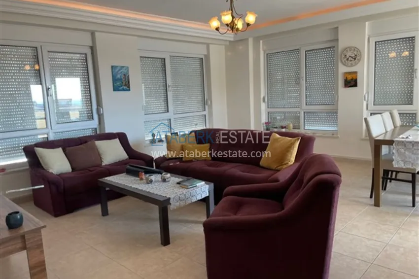 Приобрести Квартира с двумя спальнями и видом на горы и море, район Джиджилли - Алания 5 