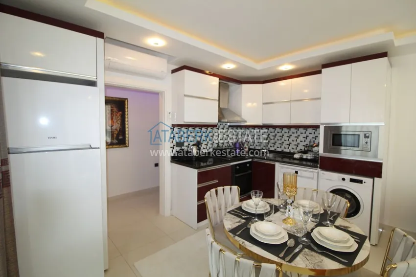 Приобрести Квартира в районе Тосмур двухкомнатная с современной мебелью и застекленным балконом 6 