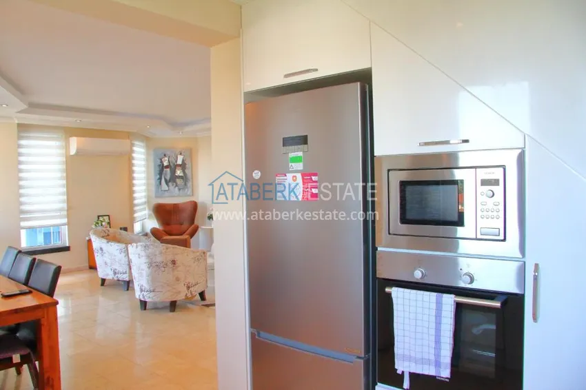 Приобрести Двухэтажная квартира в районе Тосмур с мебелью в комплексе на берегу горной реки  7 