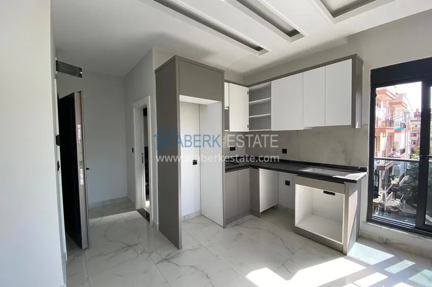 Приобрести Апартаменты 1+1 с чистовой отделкой – новостройка, центр Алании 4