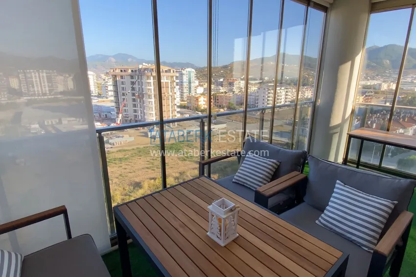 Приобрести Двухкомнатная квартира с мебелью, застекленным балконом и с панорамным открытым видом на море и горы – Газипаша 7 