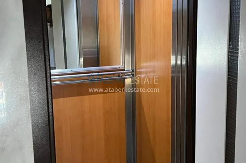 Двухуровневая квартира с мебелью и застекленным балконом в районе Джикджилли 10 