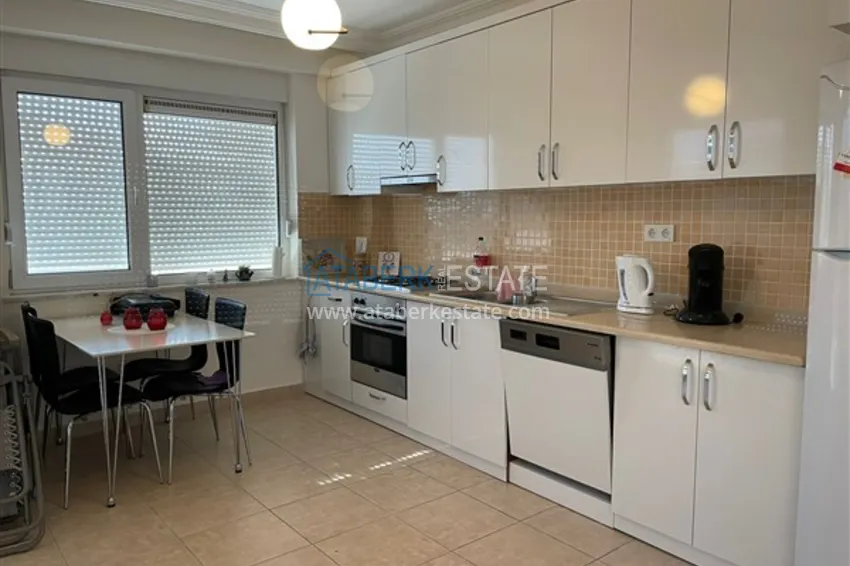 Приобрести Квартира с двумя спальнями и видом на горы и море, район Джиджилли - Алания 9 