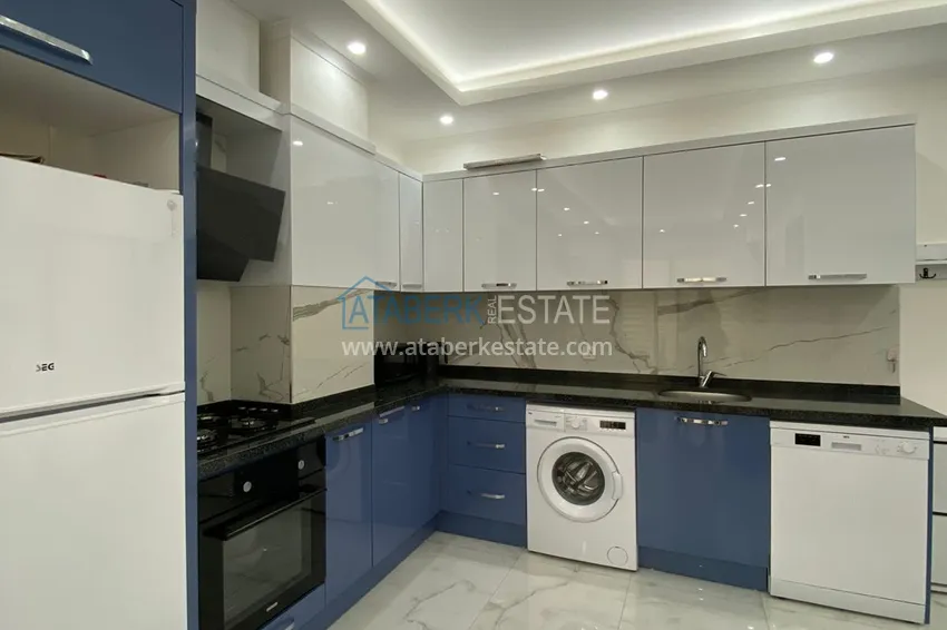 Приобрести Квартира 1+1 с мебелью в современном новом комплексе – район Махмутлар 10 